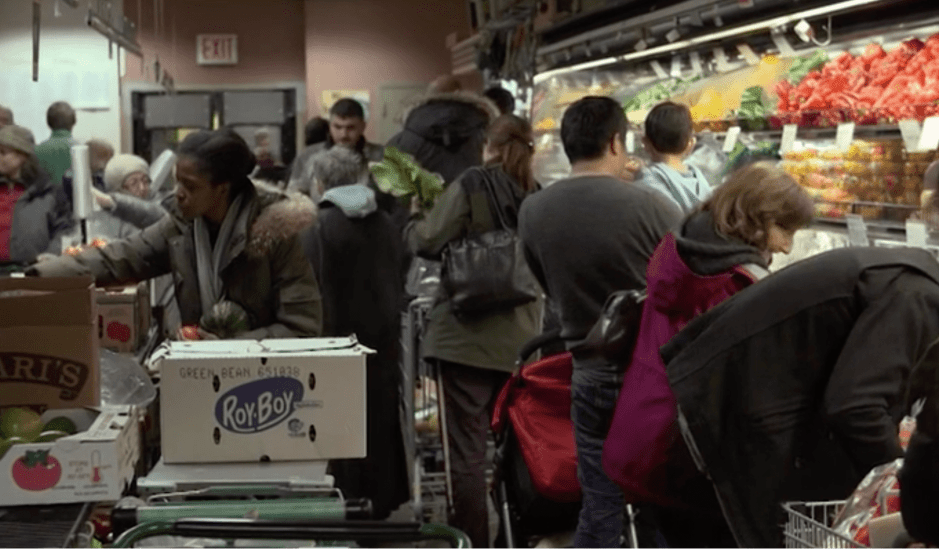 People shopping for vegetables.